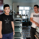 Workers at the Bitmain mine prepare to put mining machines on shelves.